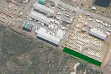 EXTENSIVE METALED YARD APPROXIMATELY 19,000M²