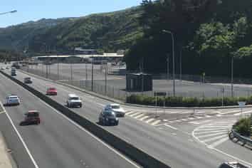 Fenced Yard Next to Motorway