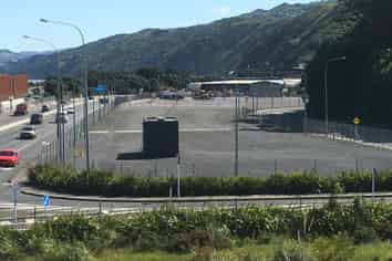 Fenced Yard Next to Motorway