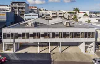 Trophy Newton Building with Development Upside