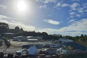 Large yard with offices and sheds