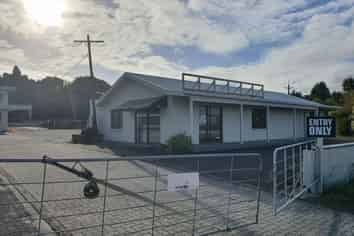 Large yard with offices and sheds
