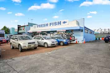 Two Titles - Two Road Frontages - Solid Income