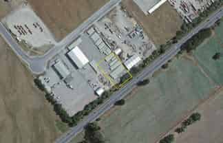 Fenced Gravel Yard In Waingawa