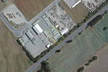 Fenced Gravel Yard In Waingawa