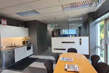 Ground floor Apollo Drive office with 10 car parks!